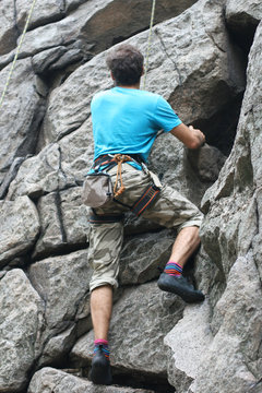 Climber girl on rock