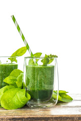 Spinach leaves smoothie in glass. Vegetarian nutrition