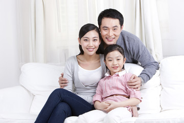 Fototapeta premium Happy family in couch