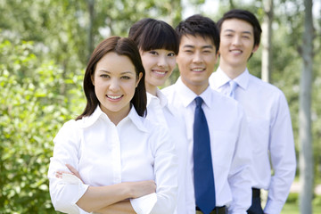 Business professionals in park