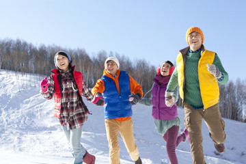 Happy young people in ski resort
