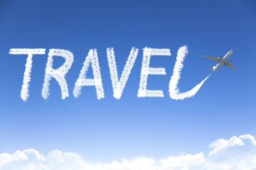 travel text drawing by airplane in the sky
