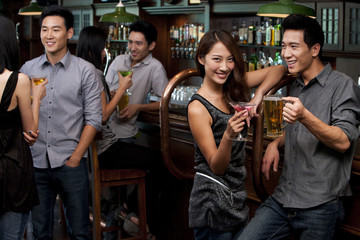 Friends Relaxing at a Bar