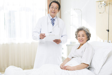 Doctor with patient in hospital