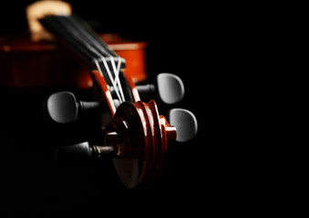 Violin neck on dark background