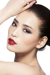 Fototapeta premium Portrait of a young woman wearing make-up