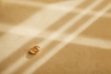 wedding rings on the table