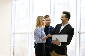 Young business people working in a conference room