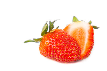 Closeup of sliced fresh juicy organic strawberries with white background