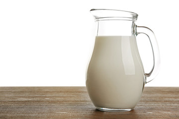 Obraz na płótnie Canvas Jar of milk on table isolated on white background