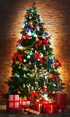 Christmas tree with presents in a room