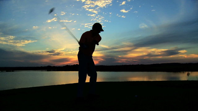 Healthy Outdoor Fitness Male Caucasian Golf Player Outdoors Sunset Silhouette