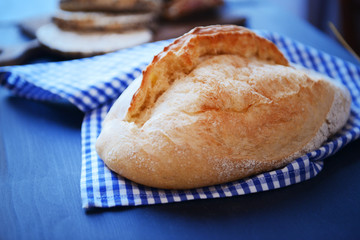 Bread on napkin on table