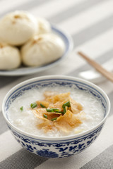 Chinese food rice porridge and steamed buns
