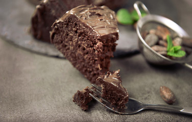 Chocolate pie with ingredients on table