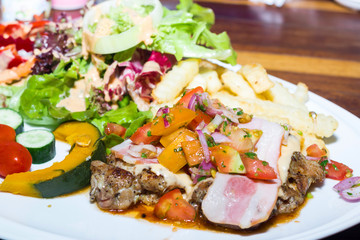 Barbecued Pork with Grilled Vegetables and fruit
