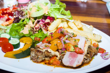Barbecued Pork with Grilled Vegetables and fruit
