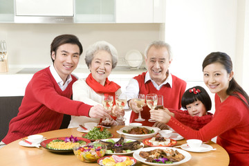 Three generations enjoying a Chinese New Year dinner together