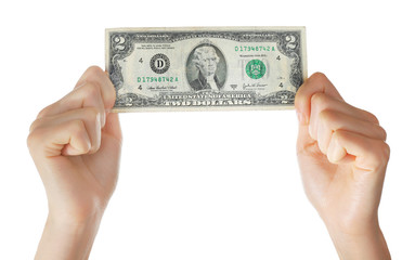 Hands holding two dollar banknote, isolated on white