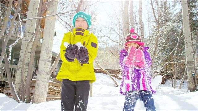 portrait Caucasian young male female children play healthy outdoor active snow
