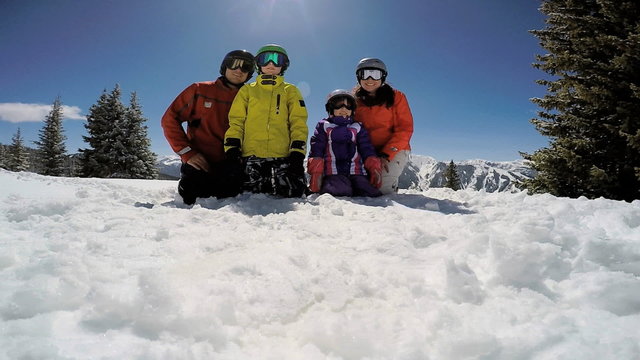 portrait snow outdoor lifestyle Caucasian family travel tourism promotion 