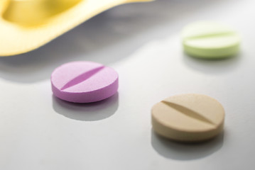 close up of drugs on white background