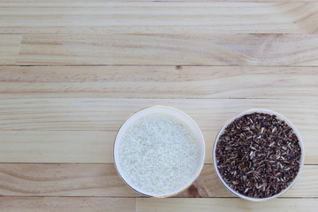 Rice on dark wooden table