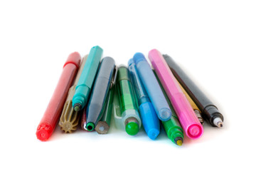 Colored felt tip standing in a box. Selective focus on front scene