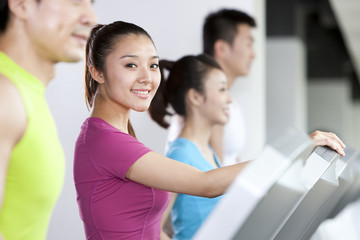 Young Woman on Treadmill