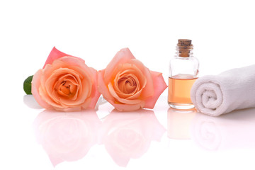 Fototapeta na wymiar Spa setting with rose with towel ,oil