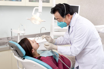 Patient receiving treatment in dental clinic