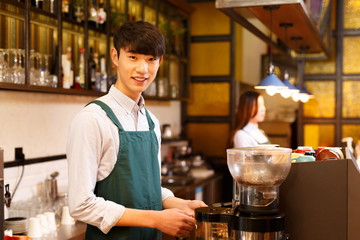 portrait waitress and waiter in cafe