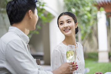 Young couple celebrating with champagne