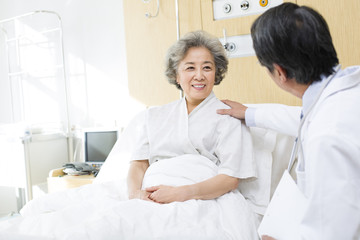 Fototapeta premium Doctor with patient in hospital