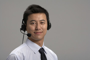 Portrait of a man wearing a headset