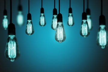 light bulbs on a cool gradient background
