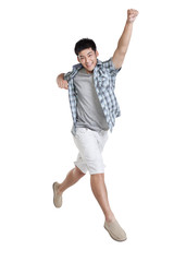 Studio shot of a happy young man