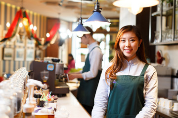 portrait waitress and waiter in cafe - obrazy, fototapety, plakaty