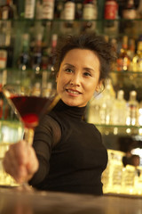 Bartender Serving Cocktail