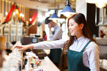 portrait waitress and waiter in cafe