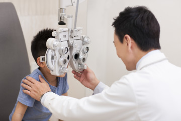 Boy receiving eyes examining