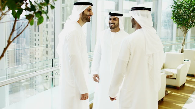 male Emirati kandura hotel leisure international travel lifestyle handshake