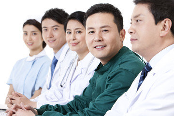 Fototapeta premium Happy doctors and nurse in a meeting