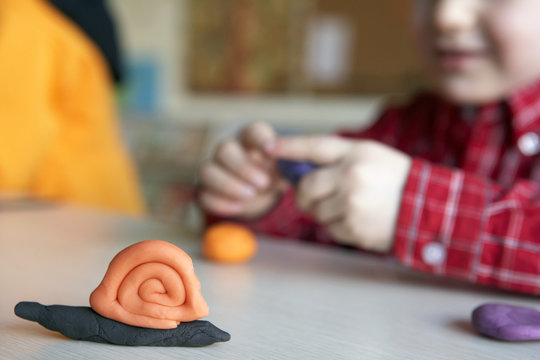 Orange And Black Play Dough Snail