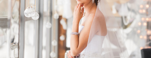 valentine's day, bridal, wedding, christmas, x-mas, winter, happiness concept - bride looking at...