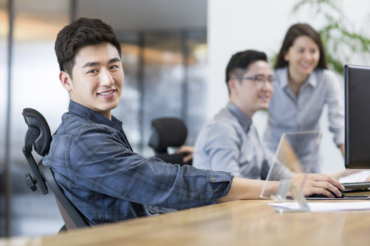 IT workers developing digital tablet