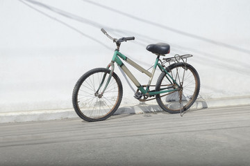 Fototapeta na wymiar old vintage bike on the street