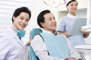 Fototapeta premium Patient receiving treatment in dental clinic