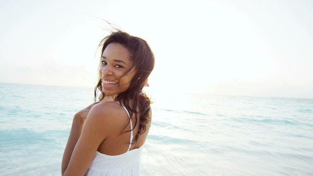 Portrait of ethnic African American female on ocean beach