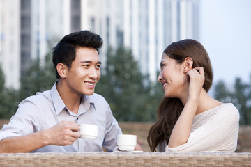 Couple Relaxing at a Cafe